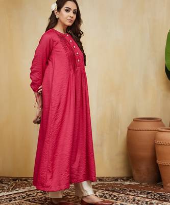 Pink plain cotton stripe kurti with tassels 1
