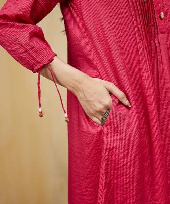 Pink plain cotton stripe kurti with tassels 4
