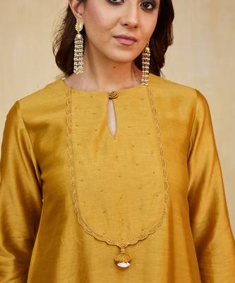Mustard plain chanderi kurti with lace detail 4