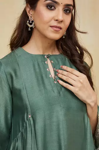 Green plain chanderi kurti with delicate embroidery