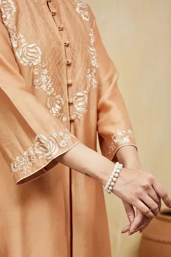 Peach embroidered chanderi jacket kurti with slip