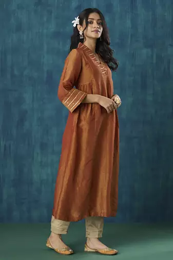 Rust plain tissue gota detail kurti