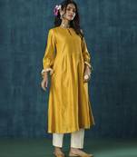 Yellow plain flowy chanderi kurti with handmade tassels