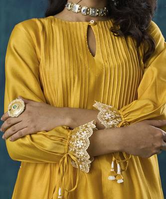 Yellow plain flowy chanderi kurti with handmade tassels 2