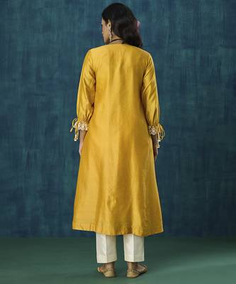 Yellow plain flowy chanderi kurti with handmade tassels 5