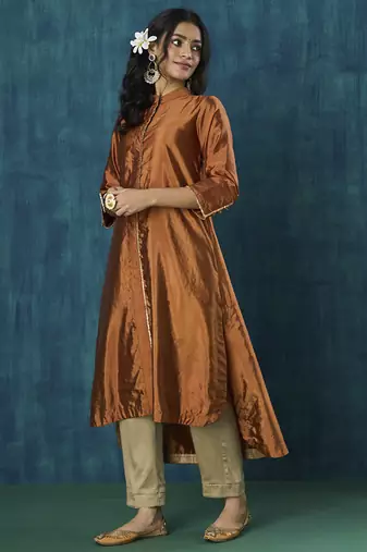 Rust tissue plain kurta with pant and dupatta.