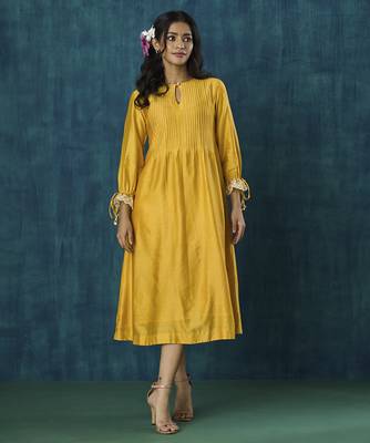 Yellow plain flowy chanderi Kurta with handmade tassels 1