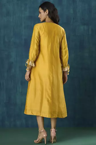 Yellow plain flowy chanderi Kurta with handmade tassels