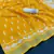 yellow linen cotton digital print saree with tassel pallu 