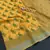 yellow linen cotton digital print saree with tassel pallu 