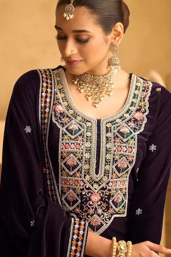 Purple embroidered velvet salwar suit
