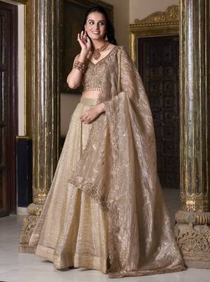 beige sequins and thread embroidered gold rush fabric indian designer latest design wedding lehenga dress 1