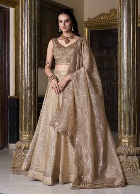 beige sequins and thread embroidered gold rush fabric indian designer latest design wedding lehenga dress 4