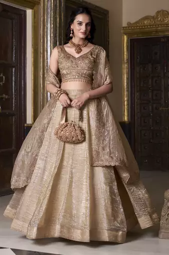 beige sequins and thread embroidered gold rush fabric indian designer latest design wedding lehenga dress