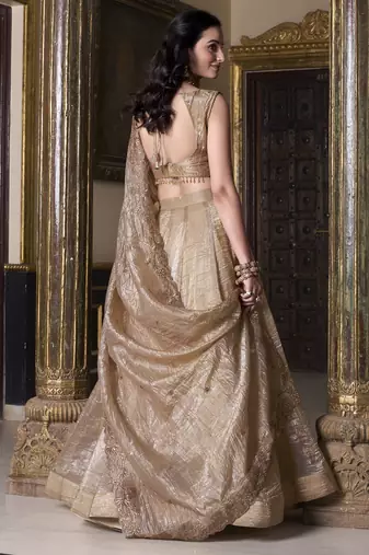beige sequins and thread embroidered gold rush fabric indian designer latest design wedding lehenga dress