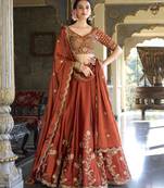 red sequins and thread embroidered rangoli silk fabric indian designer latest design wedding lehenga dress