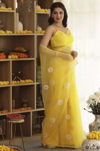 Yellow plain organza saree with daisy hand embroidery