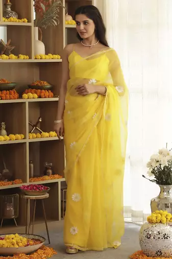 Yellow plain organza saree with daisy hand embroidery