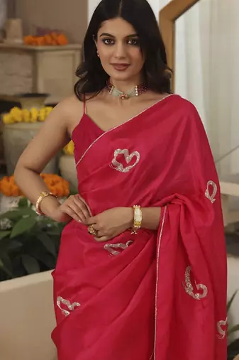 Pink plain silk blend saree with butterfly hand embroidery