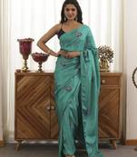 Aqua green plain silk blend saree with peacock design embroidery