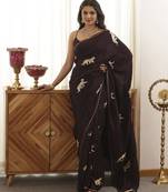 Wine plain silk blend saree with leopard design embroidery