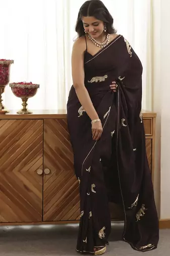 Wine plain silk blend saree with leopard design embroidery