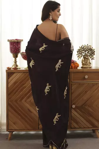 Wine plain silk blend saree with leopard design embroidery