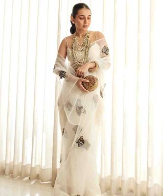 White plain organza saree with cutdana tiger motif 1