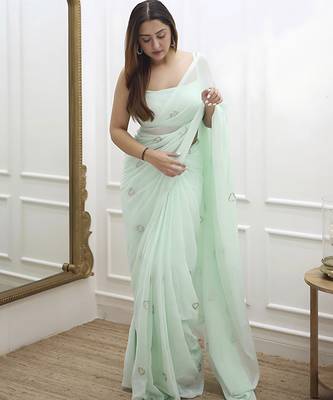 Pastel green plain georgette saree with heart motifs 1