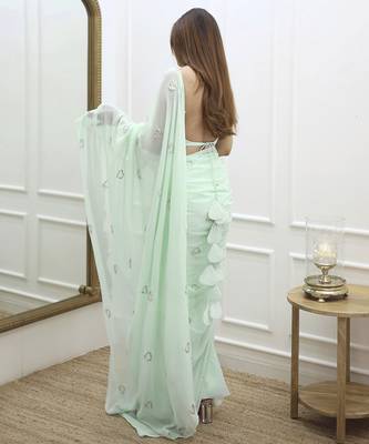 Pastel green plain georgette saree with heart motifs 3