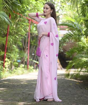 Pink plain georgette saree featuring heart motifs 3