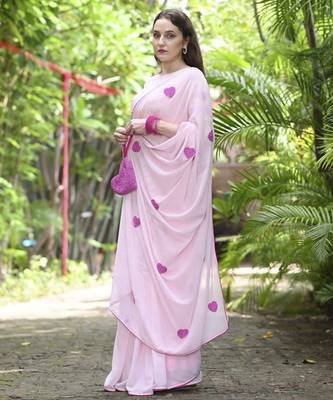 Pink plain georgette saree featuring heart motifs 4