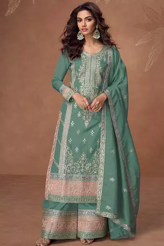 Pista green embroidery work silk palazzo