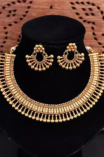 Gold-plated necklace and earrings set, south indian temple jewellery design with beaded