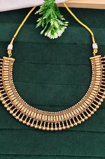 Gold-plated necklace and earrings set, south indian temple jewellery design with beaded