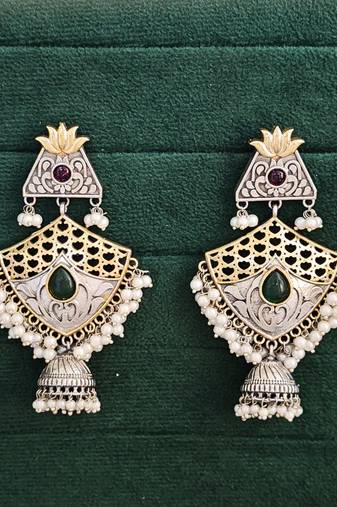 Two-tone jhumka earrings with pearl drops, green and red stones, lotus design