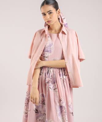 Nude pink floral printed cotton shirt dress paired with a striped slip. 2