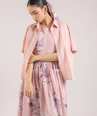 Nude pink floral printed cotton shirt dress paired with a striped slip. 3