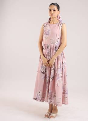 Nude pink floral printed cotton shirt dress paired with a striped slip. 4