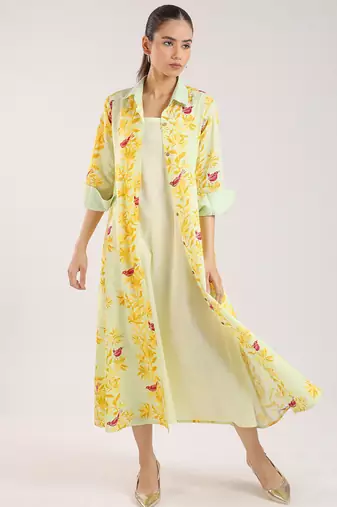 Matcha green floral printed cotton shirt dress paired with a slip.