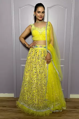 yellow zari embroidered with paper foil work georgette lehenga dress