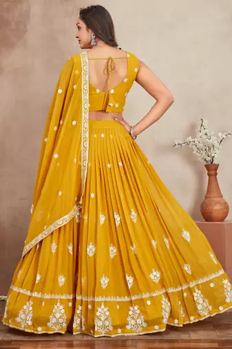 mustard yellow sequins and thread embroidered georgette lehenga dress