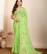 Green georgette saree with foil touch and contrast blouse