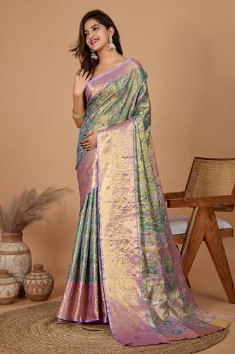 Green art silk saree with all over zari weave