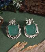 Pista green color oxidised earrings with floral motif and antique finish