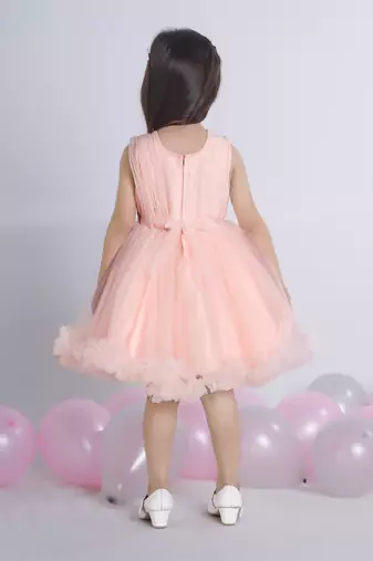 Peach embellished Sleeveless net party frock for kids