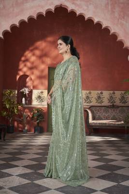 green sequin thread embroidery net saree 3