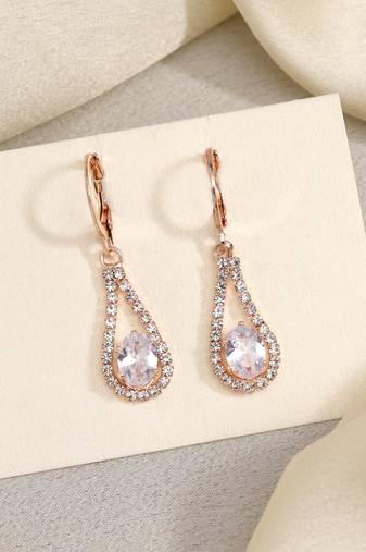 Inspired by heritage: white color antique stone earrings with regal touch
