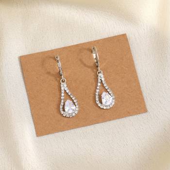 Antique-inspired glamour with silver color antique stone earrings for women 1