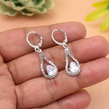 Antique-inspired glamour with silver color antique stone earrings for women 2